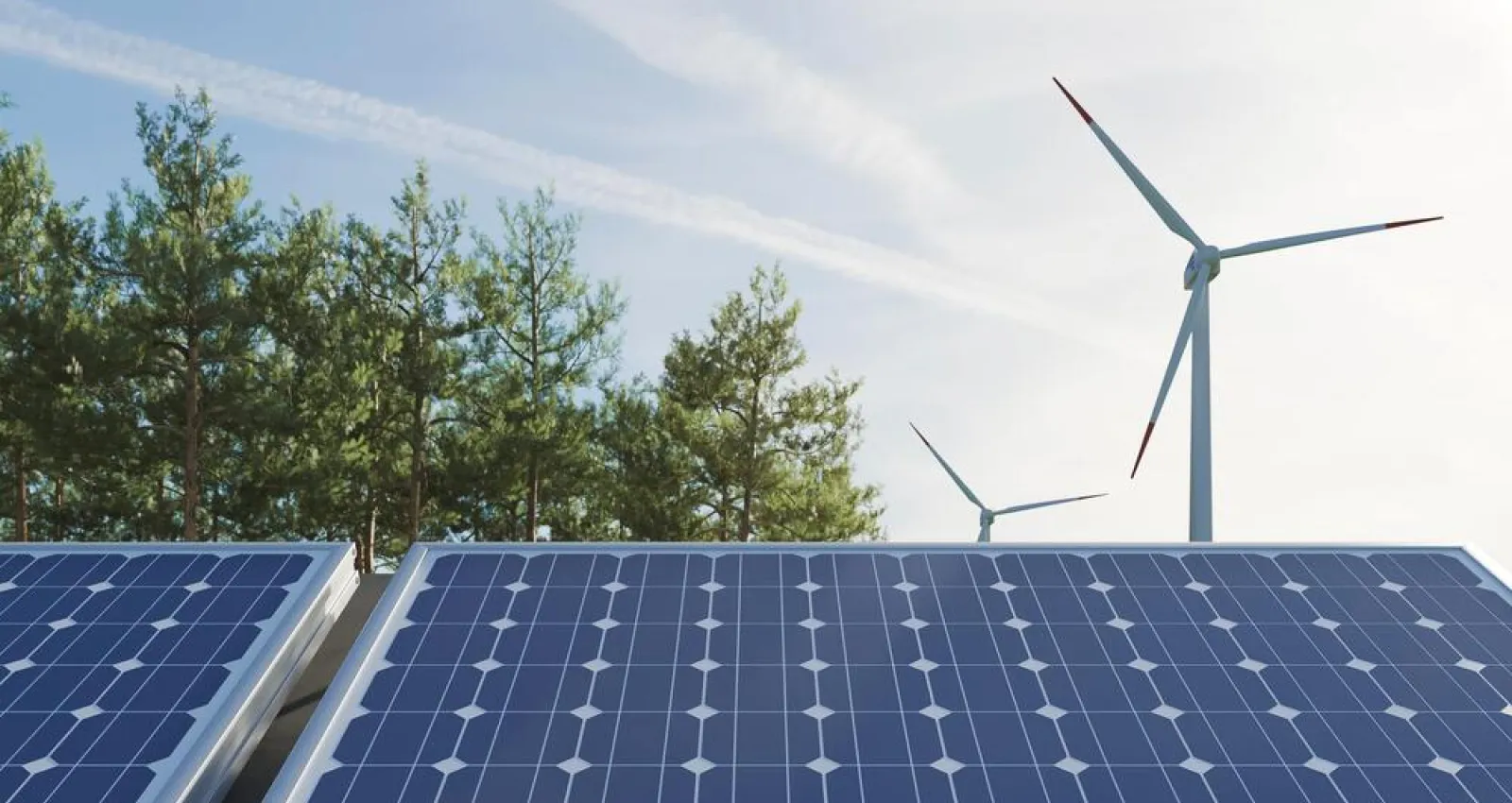 Foto de un panel solar y de fondo una de energía aeólica
