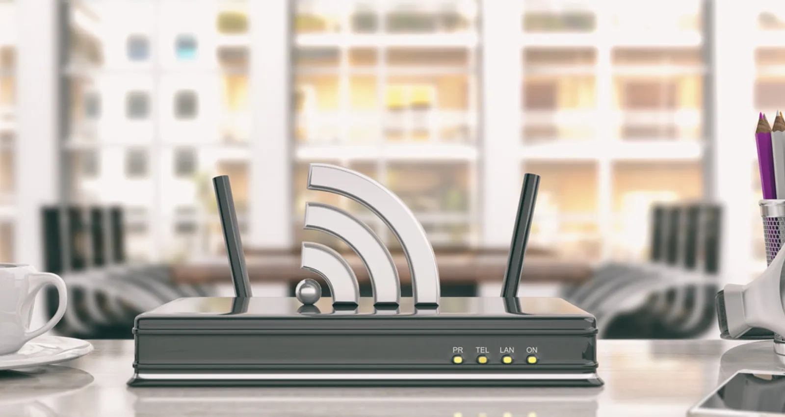 Foto de una modem de wifi negro sobre una mesa