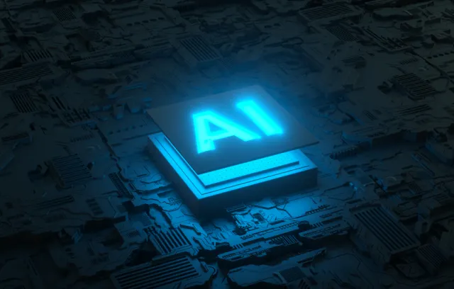 Foto de un chip azul que dice AI con fondo negro