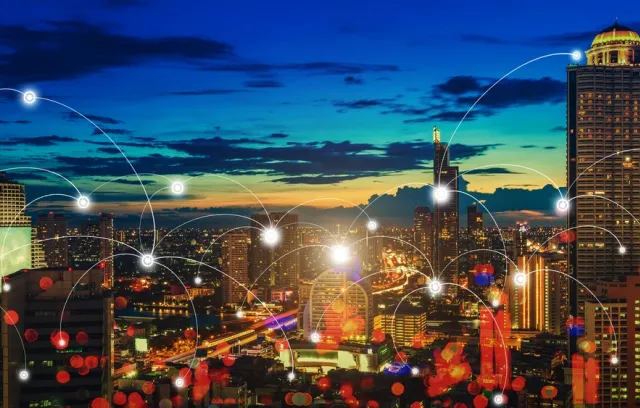 Foto de varios edificios conectados por lineas blancas