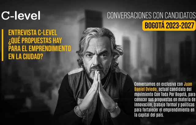 Foto de un candidato a la alcaldia de Bogotá con las manos sobre el mentón