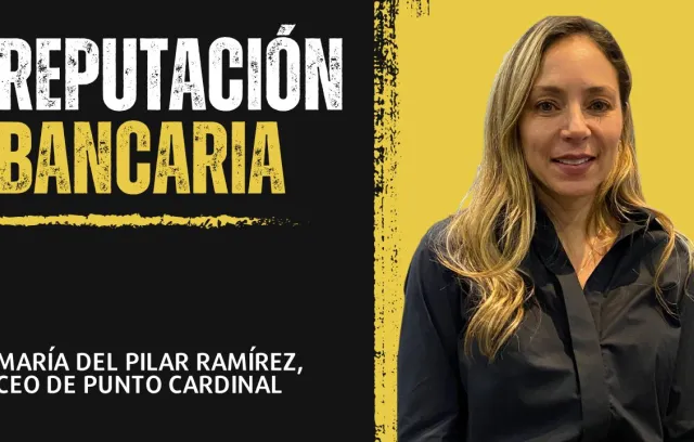 Foto de una mujer posando frente a la cámara con un fondo amarillo